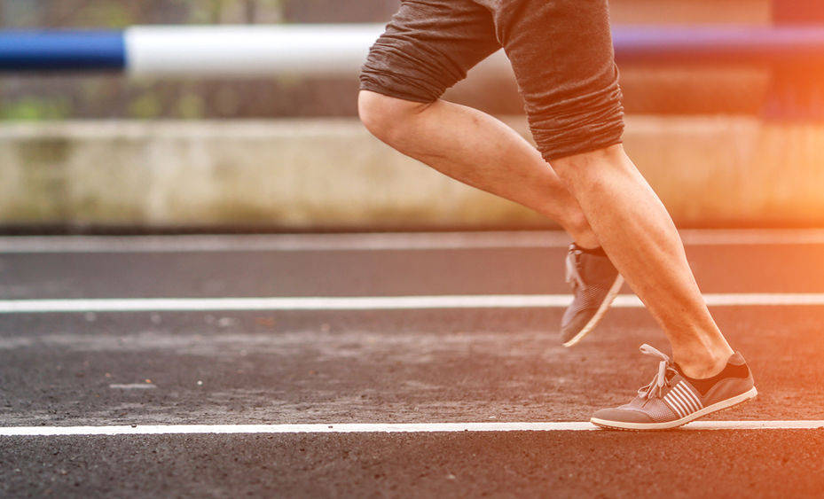 Man running on track.