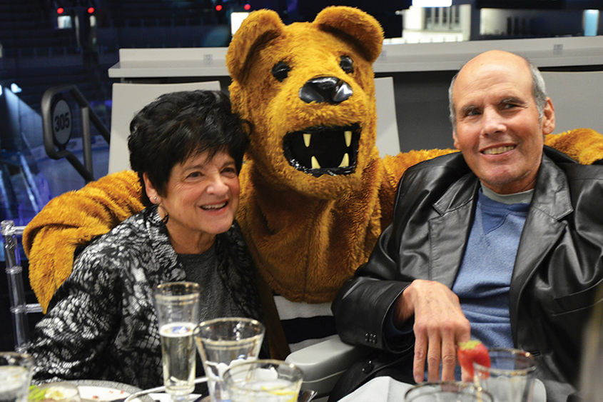 Roz and Phil Sky with the Nittany Lion