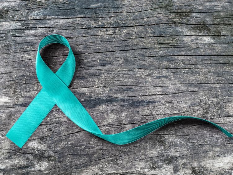 A teal ribbon representing sexual assault awareness
