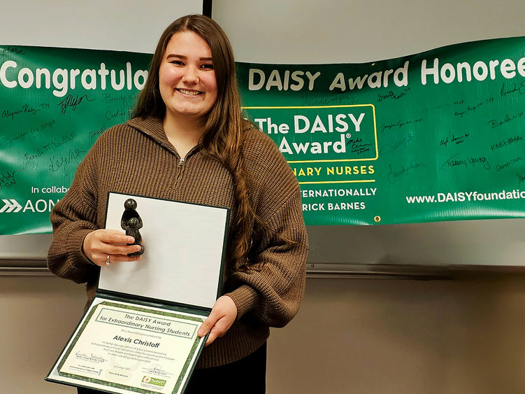 Nursing student Alexis Christoff with her DAISY award