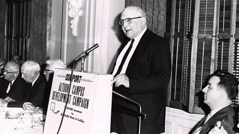 Ted Holtzinger at a podium advocating for Penn State Altoona