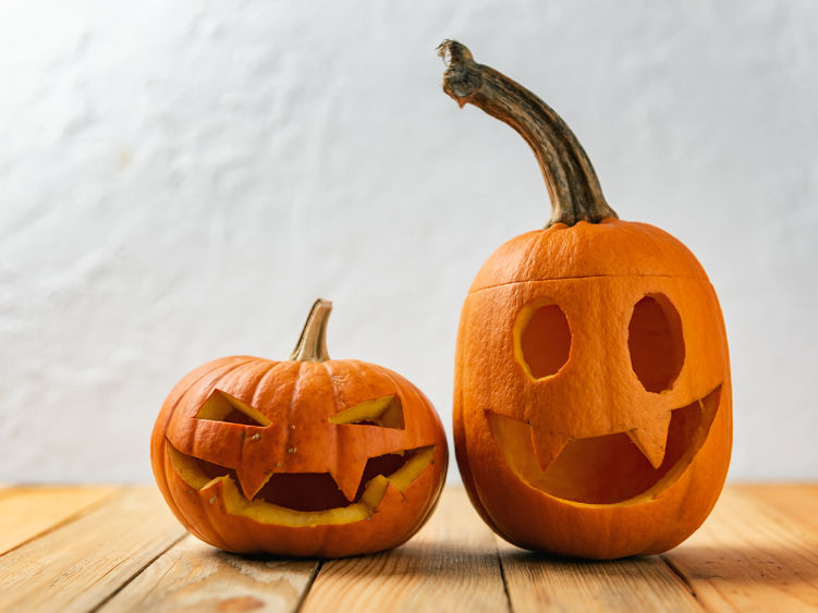 Two jack-o-lanterns with silly faces