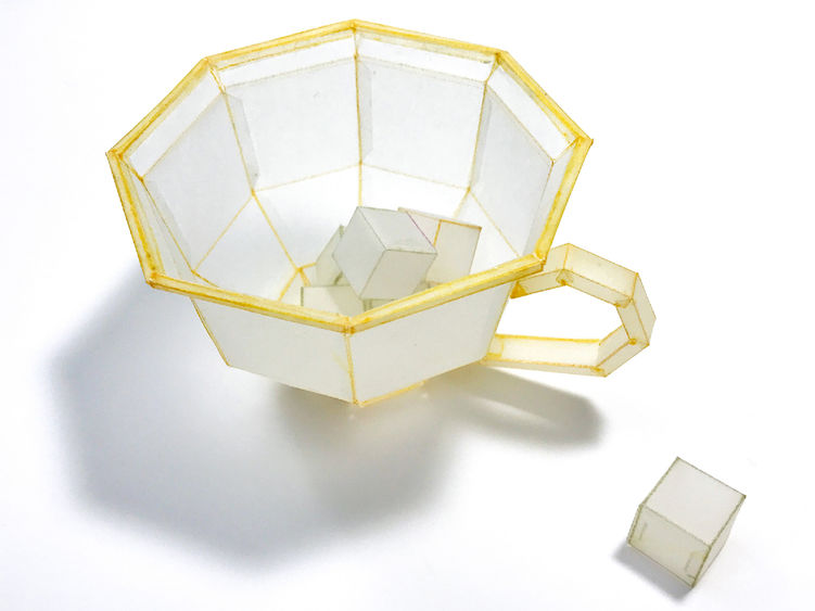 Artwork by Jennifer Seo: A paper recreation of a sugar bowl and sugar cubes