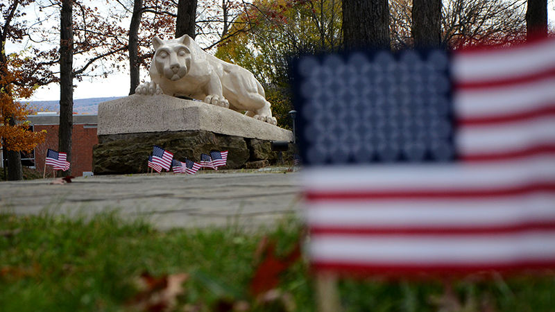 Penn State Altoona Lion Shrine with U.S. Flags