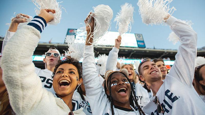 Penn State students cheering at the white out game